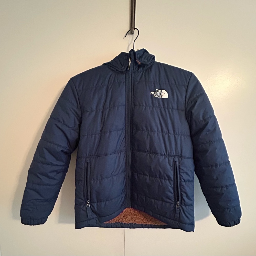 The North Face Big Kid’s Navy Puffer Jacket, Reversible.